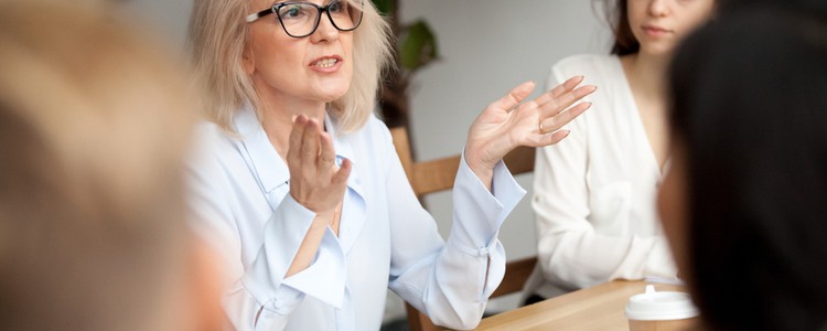 female company director talking to staff