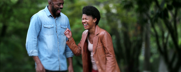 a couple laughing and smiling