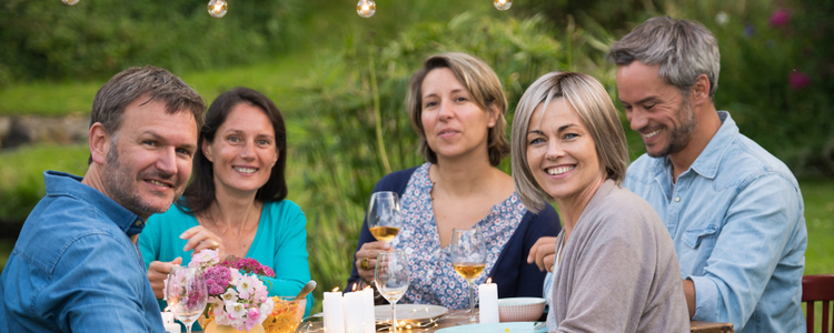 friends sitting in the garden together